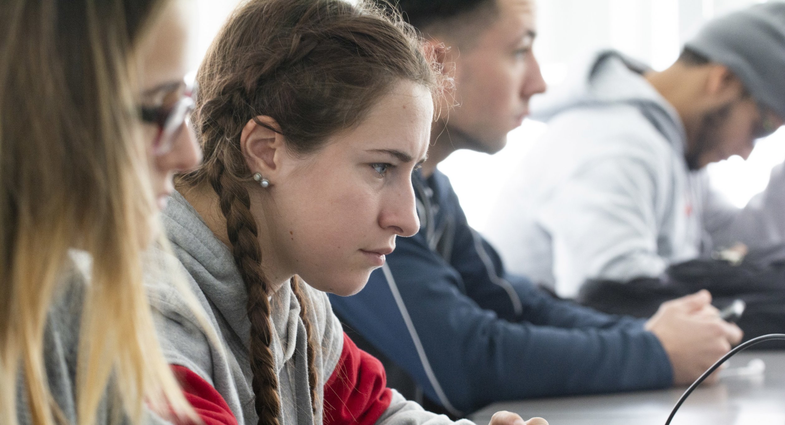 Student at computer in Joseph Giordano Cybersecurity class 0090