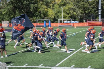 Football Players take the field at Homecoming 2026