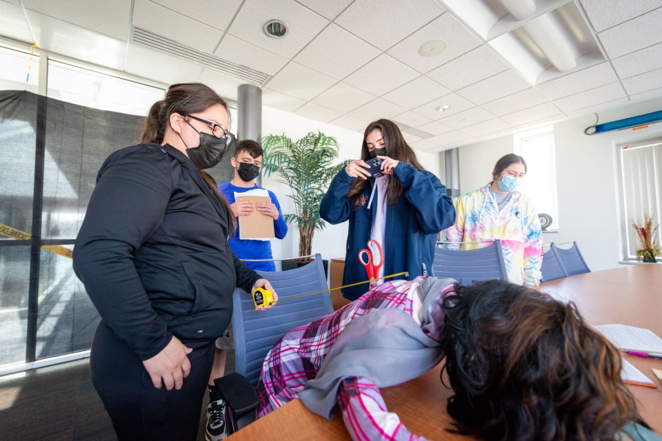 Students take part in a crime scene exercise for Criminal Justice program.